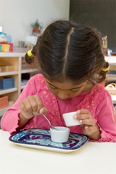 larger AA girl with spoon